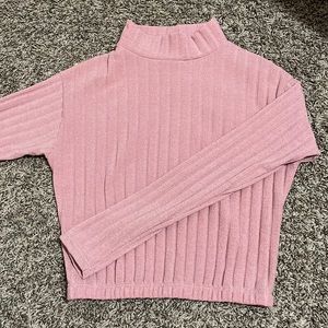 Pink turtleneck sweater